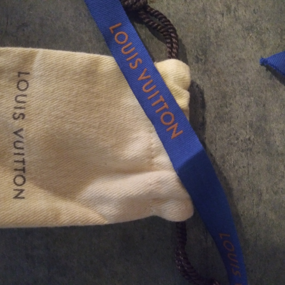 Tiny Louis Vuitton Dustbag for lock and key or ???